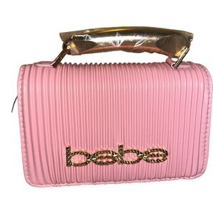 NWT Bebe pink accordion style top handle bag with a gold Crossbody chain